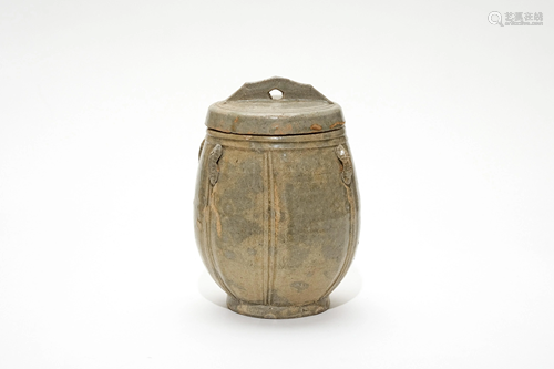 A Celadon Glazed Jar with Lid and Loop Holes