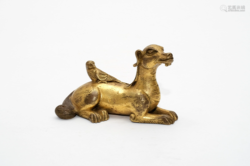 A Gilt Bronze Figure of a Mystical Beast