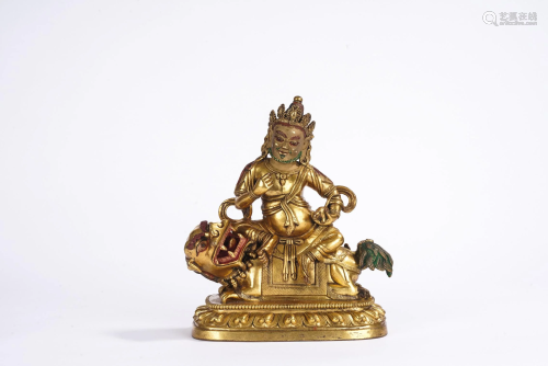 A Tibetan Gilt Bronze Figure of Vaishravana