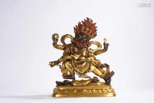 A Tibetan Gilt Bronze Figure of Six Armed Mahakala