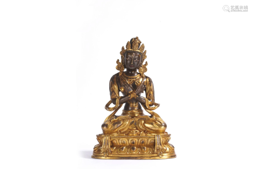 A Parcil Gilt Bronze Figure of Vajradhara