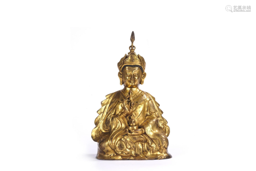 A Tibetan Gilt Bronze Figure of Guru Rinpoche