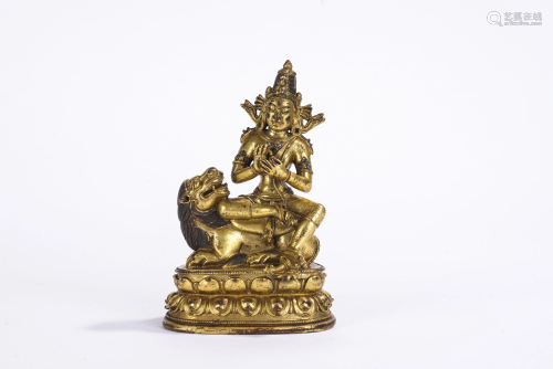 A Tibetan or Nepalese Gilt Bronze Figure of Manjusri