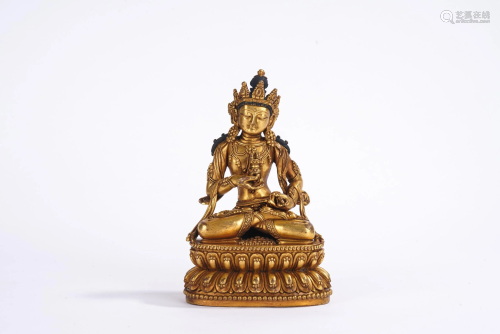 A Sino Tibetan Gilt Bronze Figure of Vajradhara