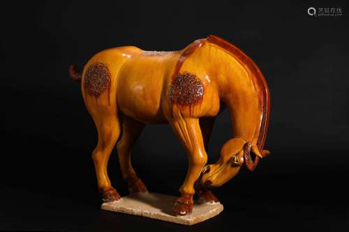 Yellow glazed sweaty horse in Tang Dynasty