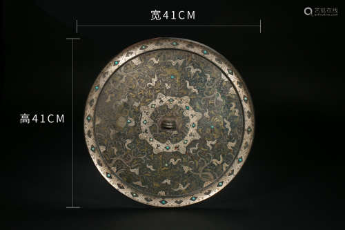 Bronze mirror inlaid with gold and silver in the Han Dynasty