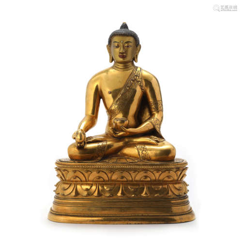 A Gilt Bronze Statue Of Medicine Buddha