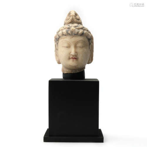 A Carved Stone Buddha Statue