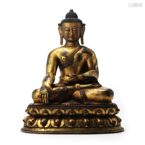 A Gilt Bronze Statue Of Shakyamuni