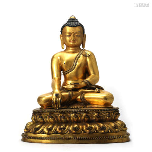 A Gilt Bronze Of Shakyamuni