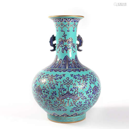 A Green Ground And Underglaze Blue Interlocking Lotus Bottle...