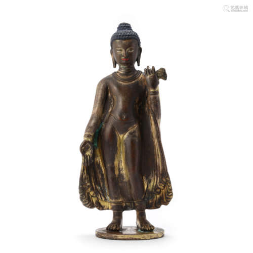 A Parcel-Gilt Bronze Figure Of Shakyamuni