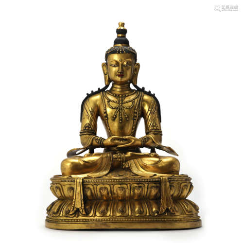 A Gilt Bronze Figure Of Buddha