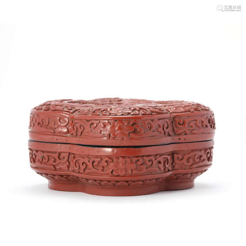 A Carved Cinnabar Lacquer Scholar And Pine Begonia-Shaped Bo...