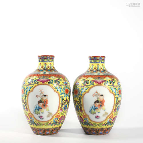 A Pair Of Yellow Ground Figural Vases