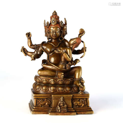 A Gilt Bronze  Seated Protector