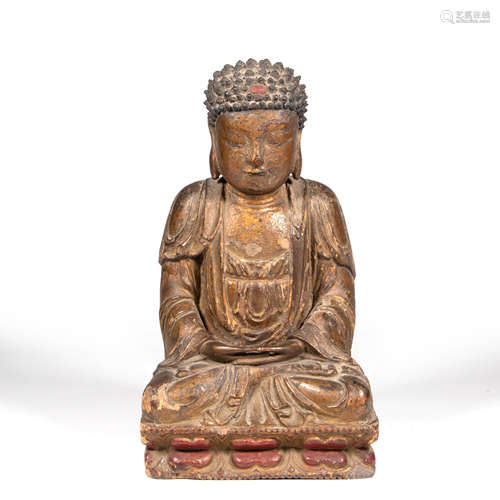 A Carved Wooden Seated Buddha