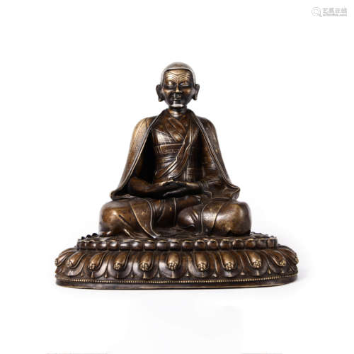 A Bronze Seated Guru