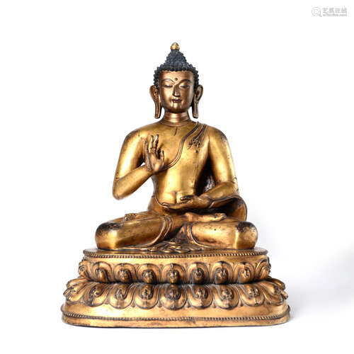 A Gilt Bronze Statue Of Shakyamuni