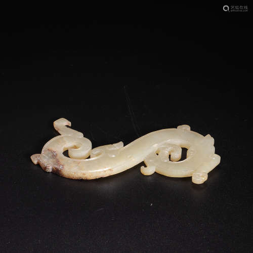 A Carved White Jade Dragon