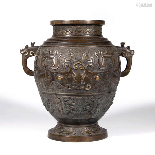 A Bronze Vase With Double Handles