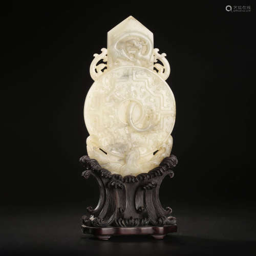 A Carved White Jade Bi