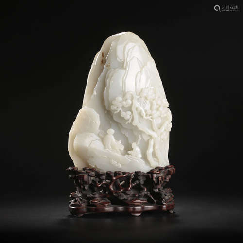 A Carved White Jade Boulder