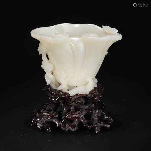 A Carved White Jade Lobed Cup