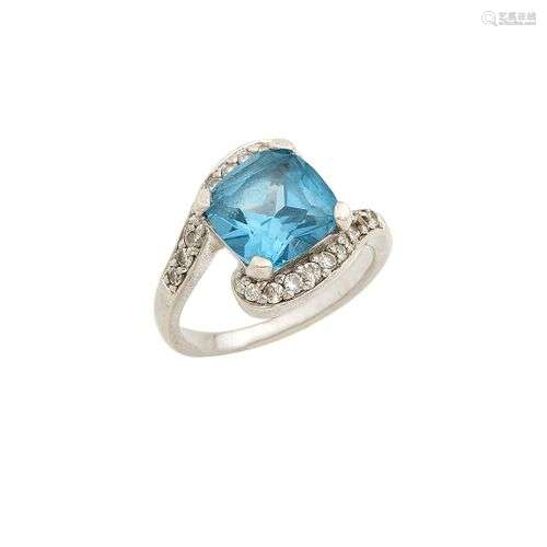 Bague en argent 925/°°, ornée d une pierre synthetique bleue...