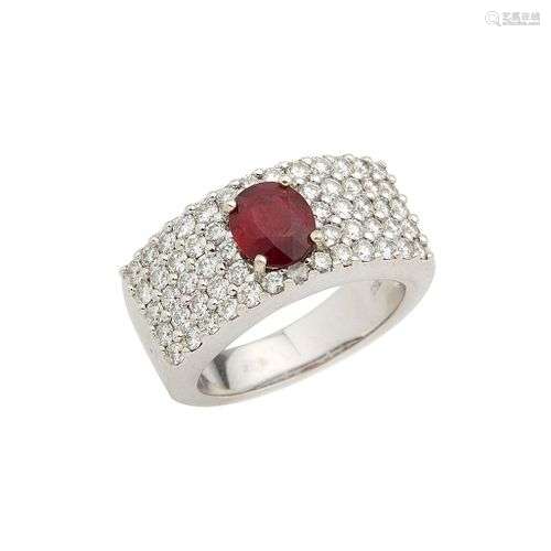 Bague jonc en or gris 18K (750/°°), centrée d un rubis, dans...