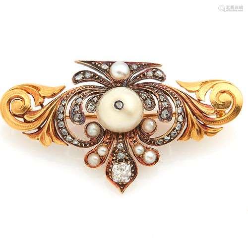 Broche en or jaune 18K(750/°°), ornée d un motif fleur de ly...