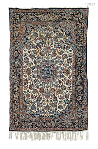 A LARGE CREAM GROUND NIAN MEDALLION CARPET AND A