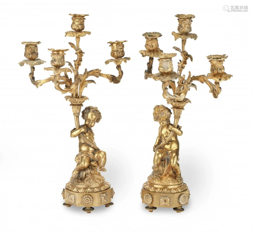 A PAIR OF 19TH CENTURY FRENCH GILT BRONZE CANDELABRA