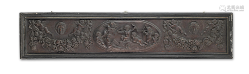 A 19TH CENTURY CARVED AND STAINED OAK RELIEF CARVED