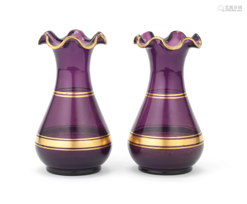 A PAIR OF SMALL GILT DECORATED AMETHYST GLASS VASES
