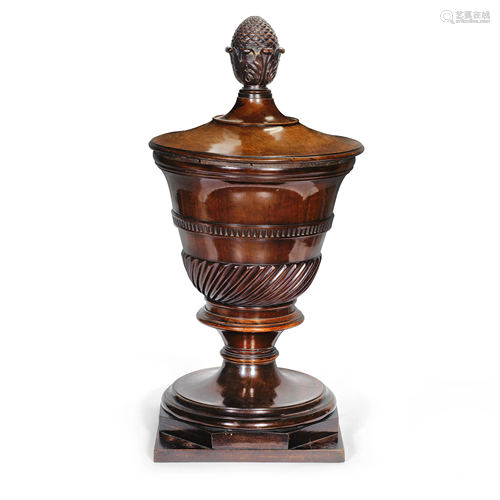 A MID 19TH CENTURY CARVED MAHOGANY URN WINE COOLER