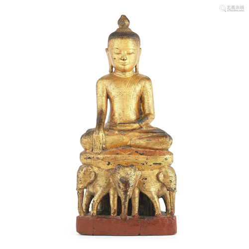 A CARVED AND GILT-WOOD FIGURE OF SEATED BUDDHA