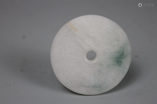 A Carved Jadeite Bi