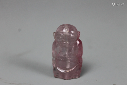 A Carved Tourmaline Pendant, Weight 17 grams