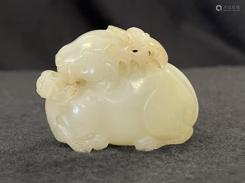 A Carved Hetian Jade Ram