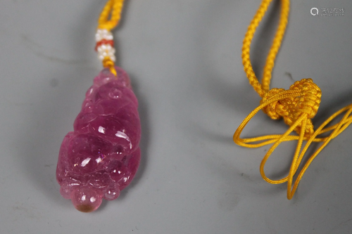 A Carved Tourmaline Pendant, Weight 18 grams