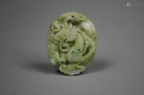 A Carved Jadeite 'Dragon' Pendant