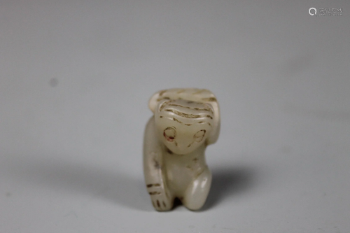 A Carved Hetian Jade Monkey