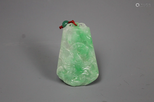 A Carved Jadeite 'Dragon' Pendant