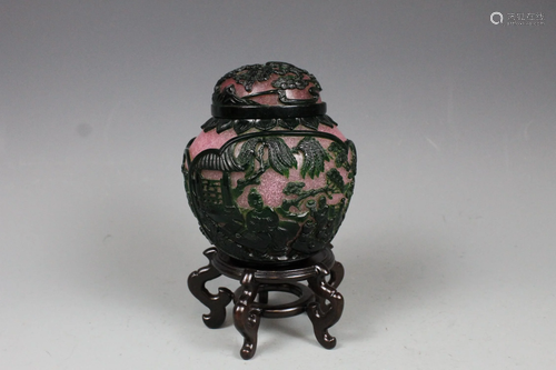 A Green Overlay Rouge-Red Glass Jar with Cover