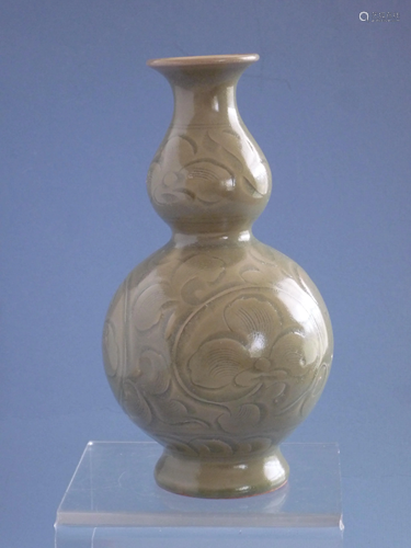 A Song-Style Carved Yaozhou Double-Gourd-Form Vase