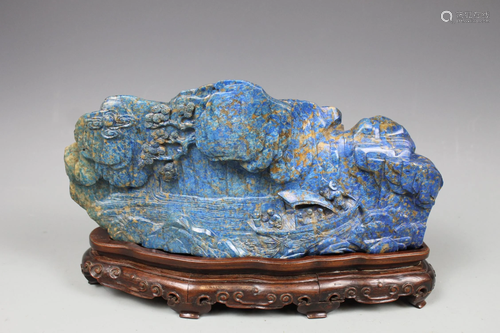 A Carved Lapis Lazuli Boulder With Stand, Qing Dynasty