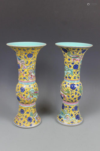 A Pair of Yellow-Ground Famille-Rose Goblets