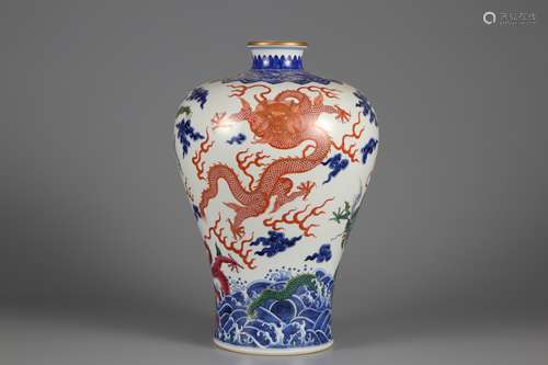 Qing Dynasty blue and white alum red dragon plum vase