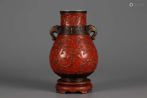 Qing Dynasty bronze glaze red color carved double ear bottle